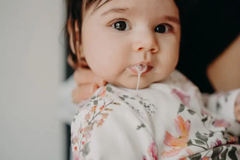 Baby with lots of dark hair and reflux